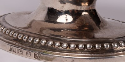 Lot 165 - A pair of George III silver sauce boats