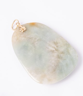 Lot 110 - A jade pendant mounted in 14K gold