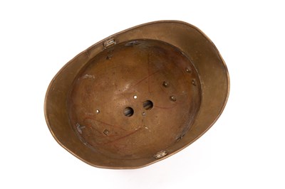 Lot 263 - A French fireman's brass helmet