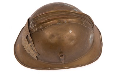 Lot 263 - A French fireman's brass helmet
