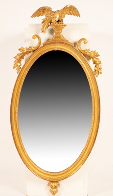 Lot 345 - A Regency oval giltwood mirror