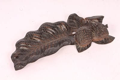 Lot 290 - A carved walnut inkstand and pen tray