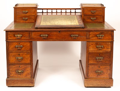 Lot 402 - A Victorian walnut twin-pedestal desk