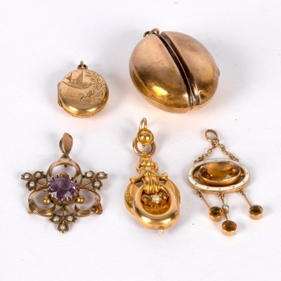 Lot 24 - An enamel and citrine pendant, the oval...