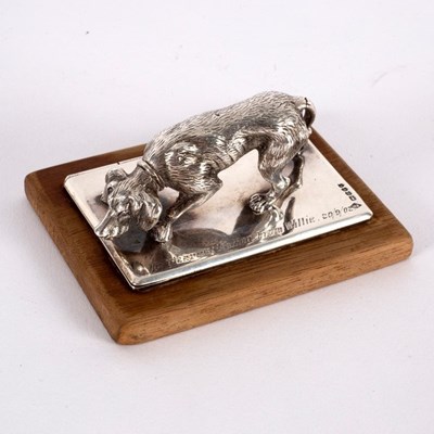 Lot 62 - A novelty silver letter clip of dog form,...