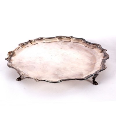 Lot 69 - A silver waiter, with pie-crust border, London...
