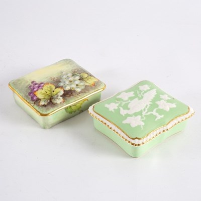 Lot 197 - A Foley lidded pin box, painted fruiting vines...