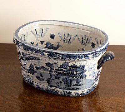 Lot 205 - A large blue and white willow pattern...