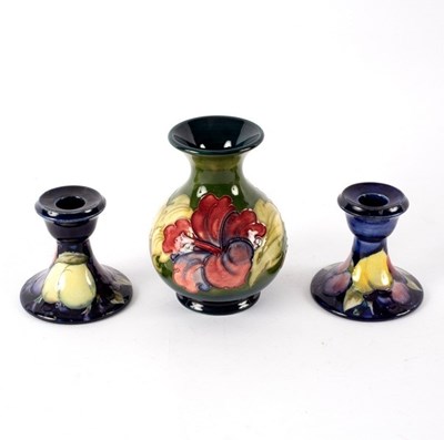 Lot 240 - A Moorcroft Hibiscus pattern vase, 14cm high...