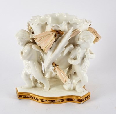 Lot 244 - A Moore porcelain centrepiece modelled as a...