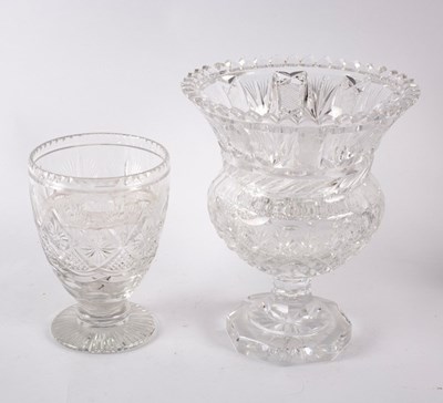 Lot 250 - A heavy cut glass thistle-shaped vase on a...