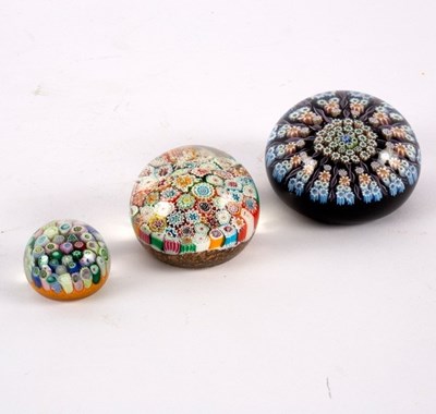 Lot 253 - A millefiori glass paperweight, 8cm diameter...