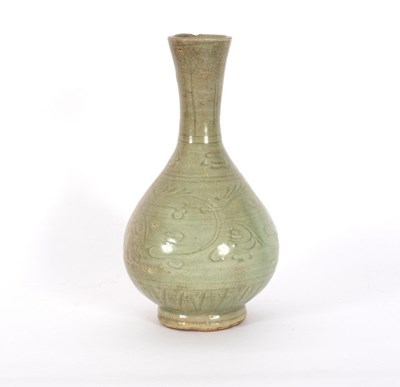 Lot 278 - A late Ming celadon glaze bottle vase, incised...