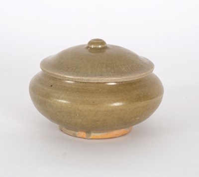 Lot 281 - An early Ming celadon glaze circular pot and...