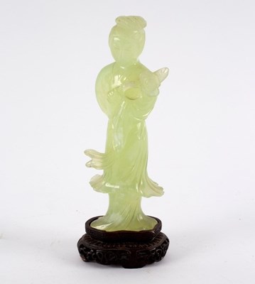 Lot 288 - A Chinese bowenite figure of Guanyin, 19th...