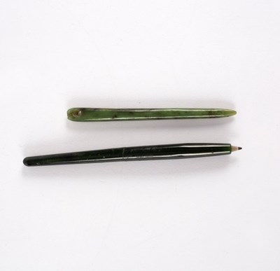 Lot 294 - A Chinese spinach jade pencil and a needle