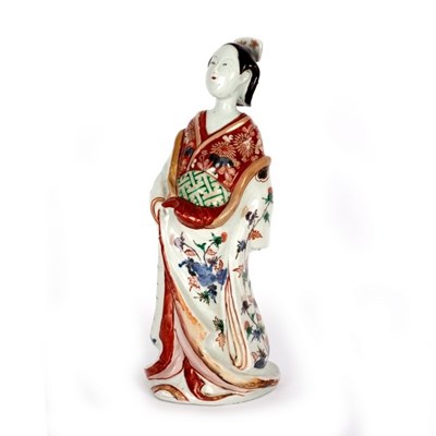 Lot 308 - A Japanese Arita figure of a Bijin, circa 1700,...