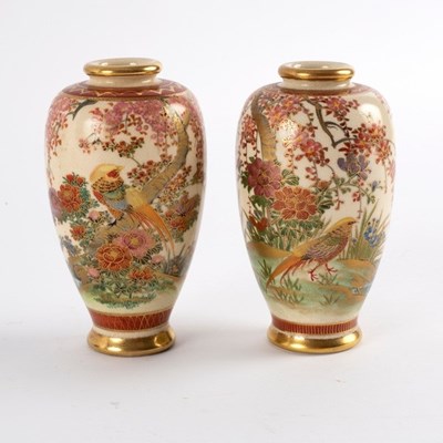 Lot 324 - A pair of Japanese Satsuma bottle vases,...