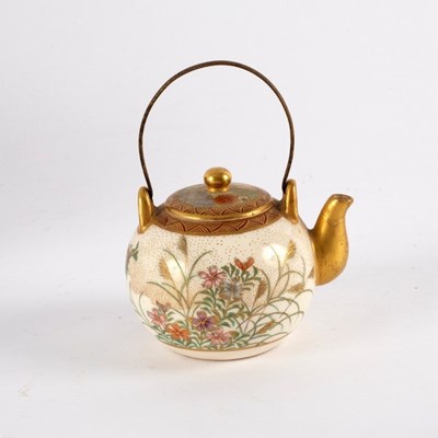 Lot 330 - A Japanese Satsuma miniature teapot and cover,...