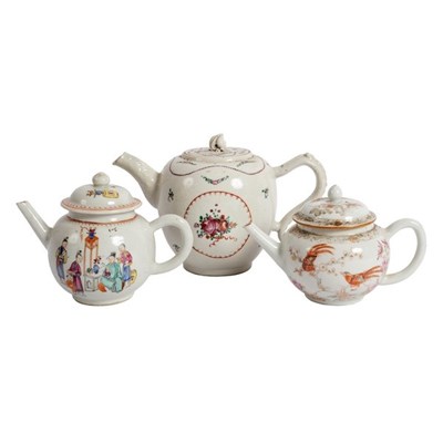 Lot 334 - Three Chinese famille rose teapots and covers,...