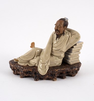 Lot 358 - A Chinese pottery figure by Liu Zemian of...