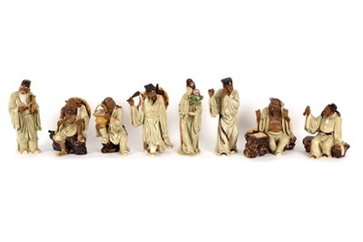 Lot 368 - Eight Chinese pottery figures by Liu Zemian of...