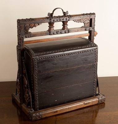 Lot 374 - A Chinese metal bound three-tier food hamper,...