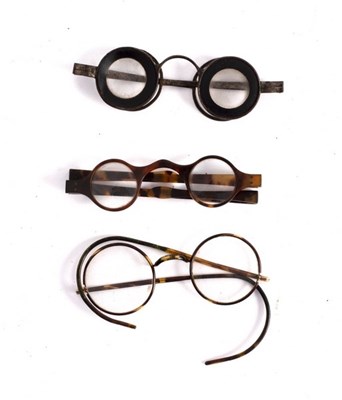 Lot 410 - A pair of steel framed spectacles in a case...