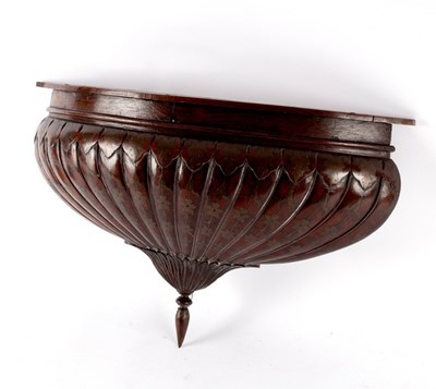 Lot 417 - A carved walnut canopy finial of reeded...