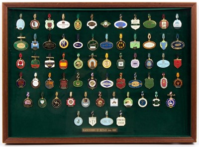 Lot 455 - A collection of sixty-three enamel racing...