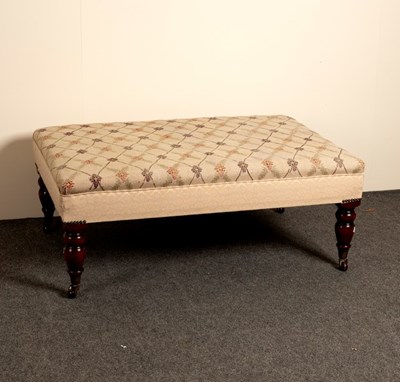 Lot 526 - A low upholstered stool on turned legs, 51cm wide