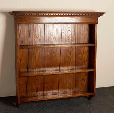 Lot 535 - An oak hanging book shelf, 85.5cm wide and a...