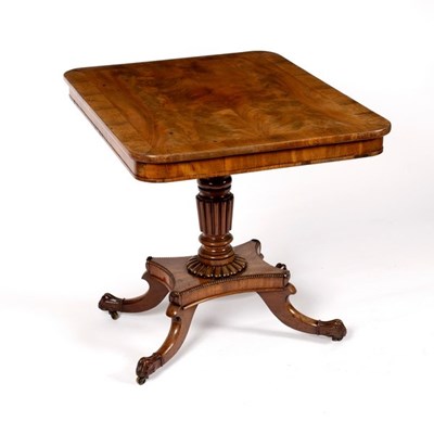 Lot 545 - A Regency rosewood table with plain frieze on...