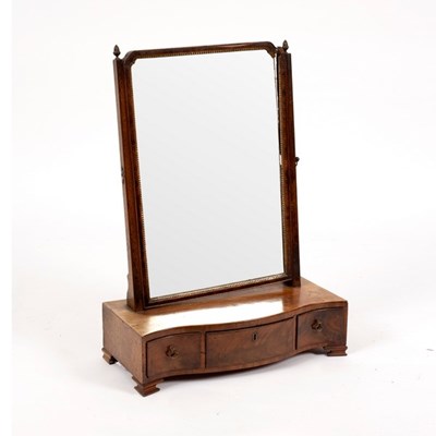 Lot 559 - A George III mahogany swing frame toilet...