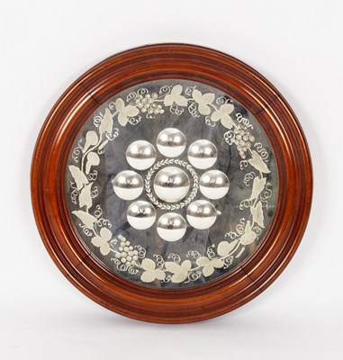 Lot 568 - A circular mirror with engraved glass surround,...