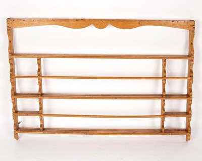 Lot 571 - A set of pine hanging shelves, 134cm wide