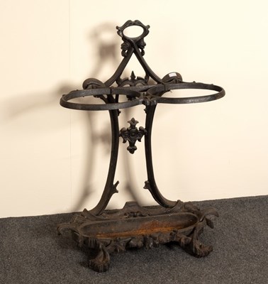 Lot 602 - A cast iron umbrella stand with pierced...