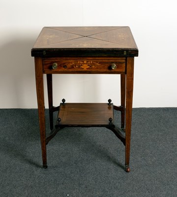 Lot 605 - An Edwardian rosewood envelope card table, on...