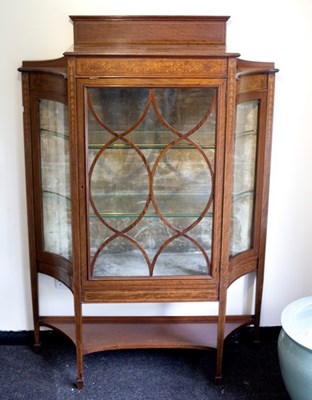 Lot 607 - An Edwardian inlaid cabinet on square taper...