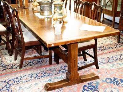 Lot 613 - An oak refectory table, on square end...