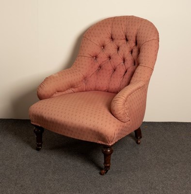 Lot 617 - A Victorian button back chair on turned legs