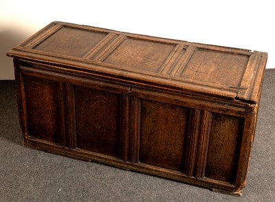 Lot 625 - A 17th Century oak coffer with triple-panel...