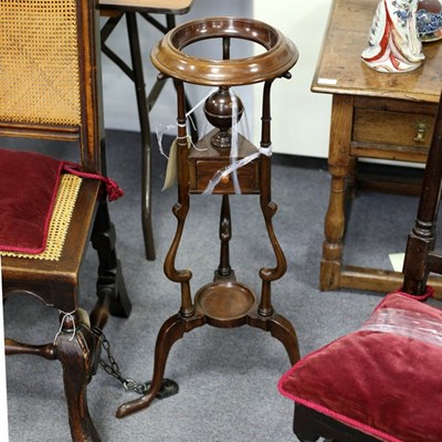 Lot 631 - A George III mahogany tripod wash stand with...