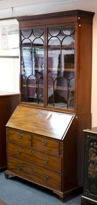 Lot 651 - A composite bureau bookcase, the upper section...