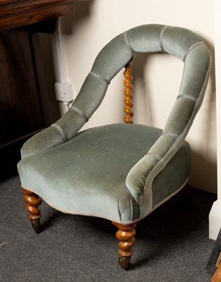 Lot 658 - A Victorian tub chair with barley twist...