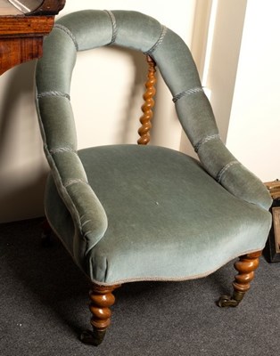 Lot 658 - A Victorian tub chair with barley twist...