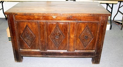 Lot 662 - An 18th Century oak coffer, the triple-panel...