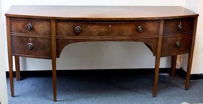 Lot 665 - An early 19th Century mahogany bowfront...