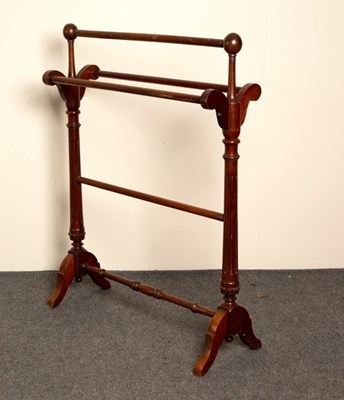 Lot 680 - A Victorian towel rail on fluted supports...