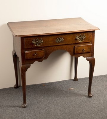 Lot 693 - A George II oak side table, circa 1750, the...